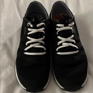 OluKai Women’s Black and White Huia Athletic Shoes